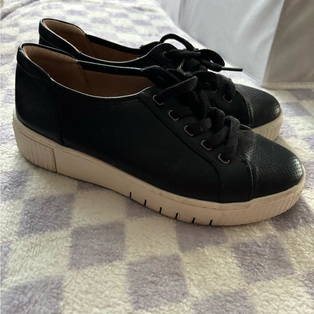Black platform sneakers